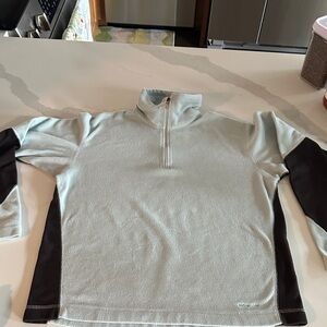 Woman’s  Light Blue and Black Patagonia fleece Sweater